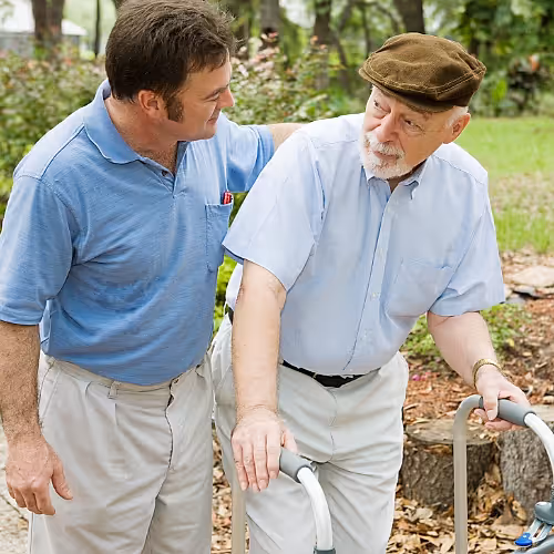 A senior adult receives IV therapy to support brain health and cognitive clarity in a calm, professional setting.