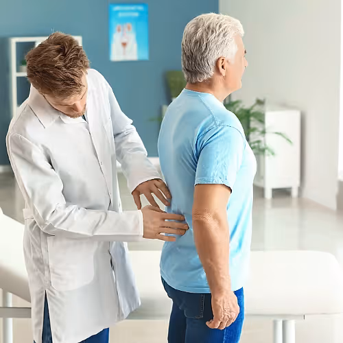 A licensed nurse prepares a hydration IV bag for a client managing chronic kidney disease, focusing on restoring hydration and nutrients.